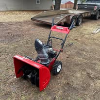 Two-stage snow blower ready for winter clearing